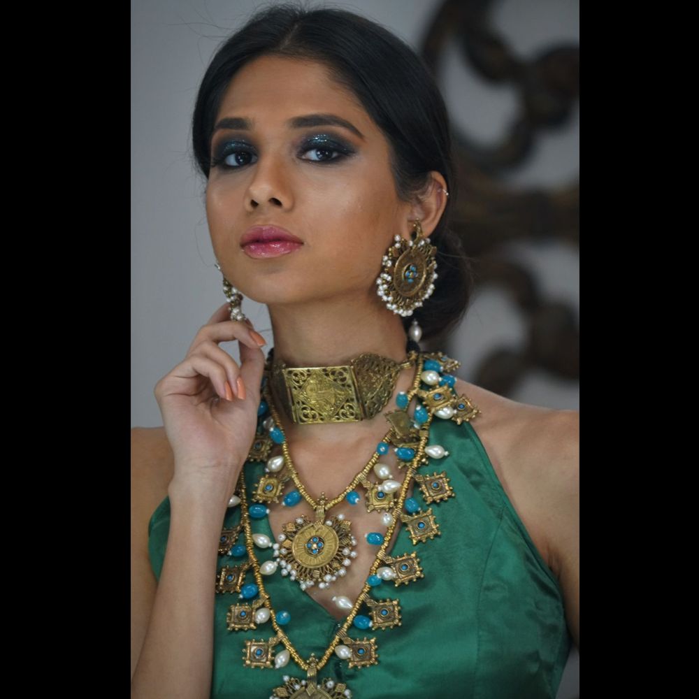 Set of Three Necklaces and Earrings